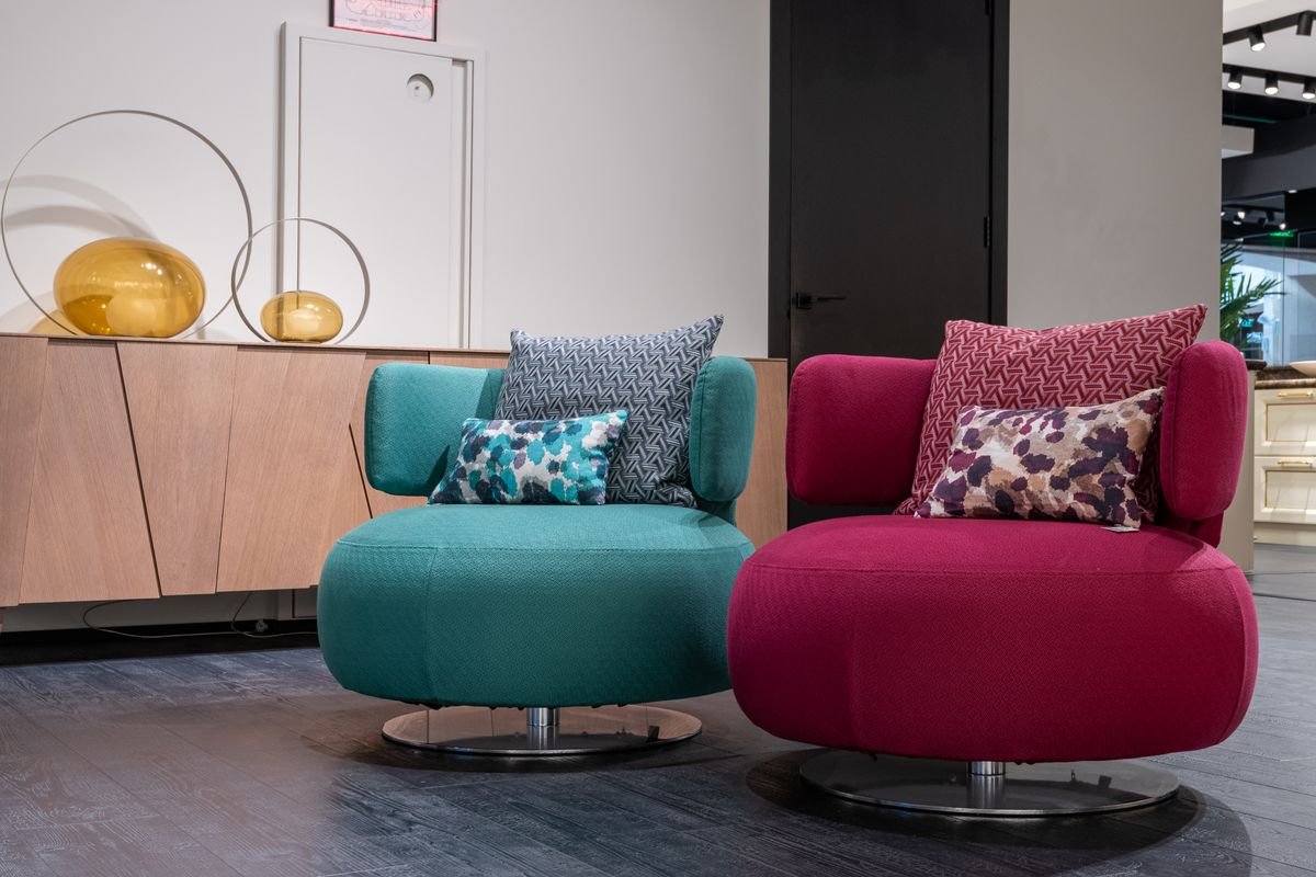 Designer armchairs in a contract furniture setting
